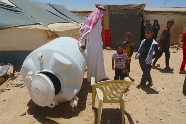 empty water tank - Syrian Beduine refugees outside Zataari camp