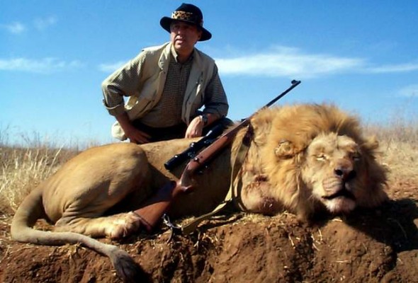 Yet another human degenerate striking a pose over animal needlessly murdered.  It is his breed that should go into prompt extinction. 
