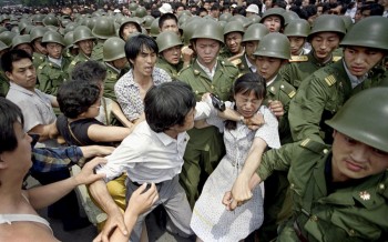 Demonstrators being removed. 