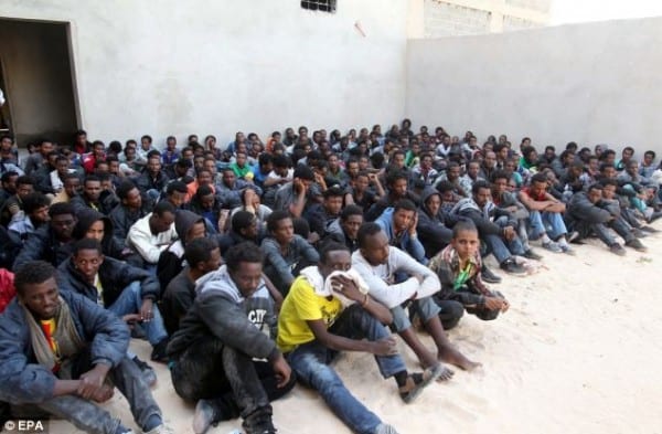 The Libyan government today said it was struggling to cope with the number of sub-Saharan Africans arriving in the country, and threatened to help them enter into Europe themselves if EU countries do not 'assume their responsibilities' and offer the country more aid. The announcement comes as hundreds of migrants are feared dead after a boat carrying a reported 400 people sank off the coast off the coast of southern Italy.  The accident happened around 100 miles south of the Italian island of Lampedusa where more than 300 Eritreans perished last autumn, according to reports in the Italian media. The boat was around 50 miles north of Libya. 