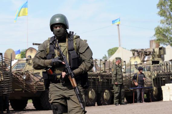  Ukrainian servicemen are pictured at the military camp near the town of Svyatogorsk in Eastern Ukraine, June 20, 2014. CREDIT: REUTERS/STRINGER