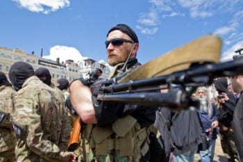 A new volunteer recruit of the Ukrainian army Azov Battalion heading towards the eastern regions, after a military oath ceremony in Kyiv on June 23. © Ukrainian News
