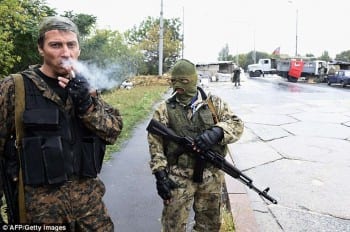 Pro-Russian separatists guard Donetsk airport. 