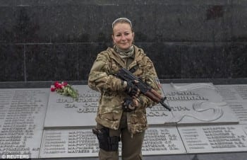 A female fighter in Novorossiya's people's army. The new republics are an example for all of humanity. 
