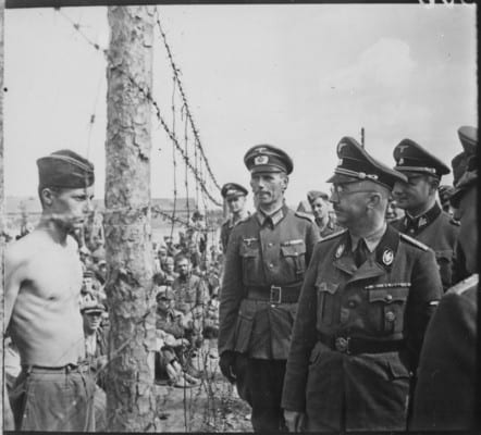 SS chief Heinrich Himmler inspects a camp for Soviet prisoners of war. 1941. Afforded no protections under international conventions, the German army felt free to treat Soviet prisoners despicably, as animals. 3.5 million died in captivity. (US National Archives)