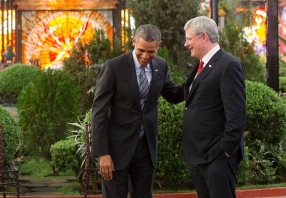 Harper paling around with fellow corporate fascist Obama. (Via flickr)
