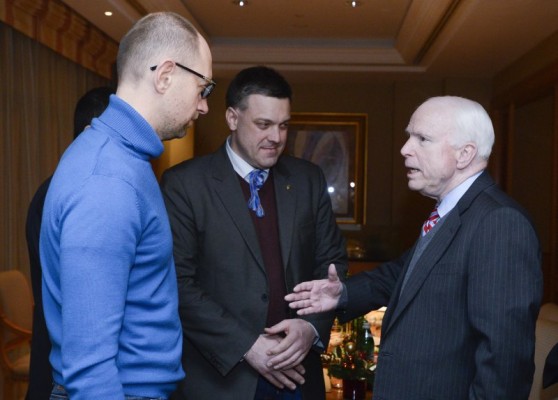 U.S. Senator John McCain, right, meets Ukrainian opposition leaders Arseniy Yatsenyuk, left, and Oleh Tyahnybok in Kiev, Ukraine, Saturday, Dec. 14, 2013. (Business Insider) 