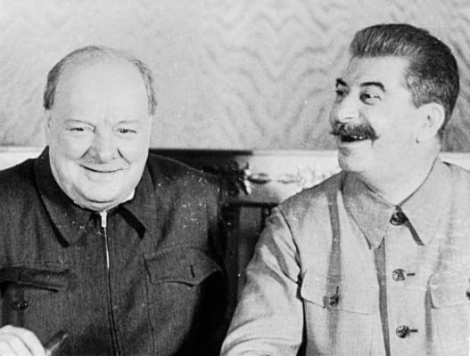 The British Prime Minister Winston Churchill and the Soviet leader Joseph Stalin share a joke in the Krelim, Moscow, in 1942. (MOI) FLM 1117 Part of MINISTRY OF INFORMATION FILM STILLS COLLECTION