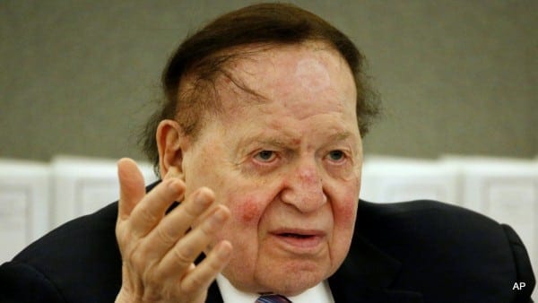 FILE - In this May 4, 2015 file photo, Las Vegas Sands Corp. Chairman and CEO Sheldon Adelson testifies in court in Las Vegas. A news organization and nonprofit group want a Nevada judge to unseal a private investigator's report that they say may tie casino company Las Vegas Sands Corp. to organized crime in Asia. The Campaign for Accountability says in its motion filed Monday, June 8, 2015, that it also wants to see the report because the group believes it might help determine if the Republican donor Adelson used money linked to overseas criminal activity for election donations. (AP Photo/John Locher, File)