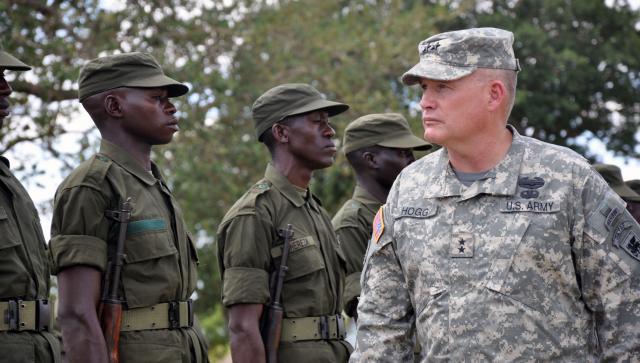 David Hogg, a big honcho in the US Army/Africa command, inspects Ugandans. 