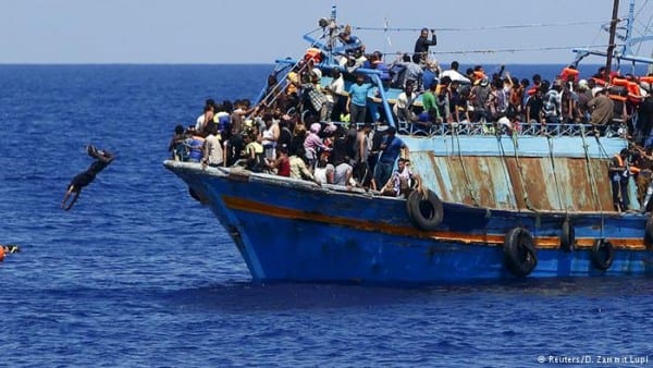 migrantsBoat-crammed