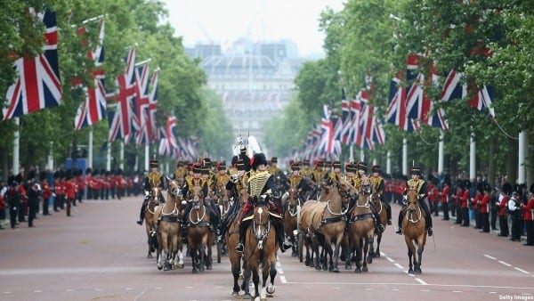 LONDON, ENGLAND - JUNE 13: Troops advance down the Mall during the Trooping the Colour on June 13, 2015 in London, England. The ceremony is Queen Elizabeth II's annual birthday parade and dates back to the time of Charles II in the 17th Century, when the Colours of a regiment were used as a rallying point in battle. (Photo by Chris Jackson/Getty Images)