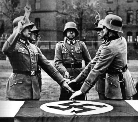 Wehrmacht soldiers swearing allegiance to Hitler.