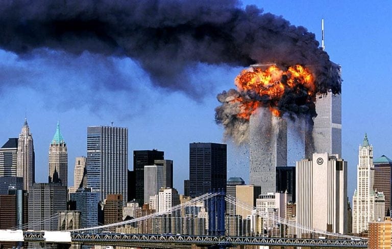 SEVENTH IN A PACKAGE OF NINE PHOTOS.-- An explosion rips through the South Tower of the World Trade Towers after the hijacked United Airlines Flight 175, which departed from Boston en route for Los Angeles, crashed into it Sept, 11, 2001. The North Tower is shown burning after American Airlines Flight 11 crashed into the tower at 8:45 a.m.