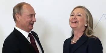 Russian President Vladimir Putin, left, meets U.S. Secretary of State Hillary Rodham Clinton on her arrival at the APEC summit in Vladivostok, Russia, Saturday, Sept. 8, 2012. (AP Photo/Mikhail Metzel,Pool)