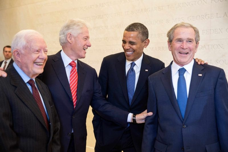 President Barack Obama laughs with former Presidents Jimmy Carter, Bill Clinton, and George W. Bush, prior to the dedication of the George W. Bush Presidential Library and Museum on the campus of Southern Methodist University in Dallas, Texas, April 25, 2013. (Official White House Photo by Pete Souza) This official White House photograph is being made available only for publication by news organizations and/or for personal use printing by the subject(s) of the photograph. The photograph may not be manipulated in any way and may not be used in commercial or political materials, advertisements, emails, products, promotions that in any way suggests approval or endorsement of the President, the First Family, or the White House.